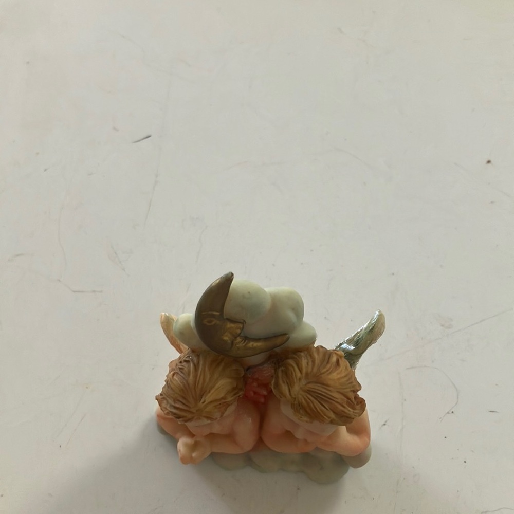 Cherub Figurine with Bird